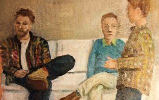 two people on a white sofa