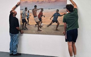 Oil painting beautiful game beautiful sunset being hung in interim show