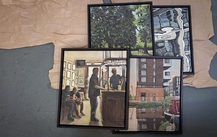 Prepping paintings for gallery show